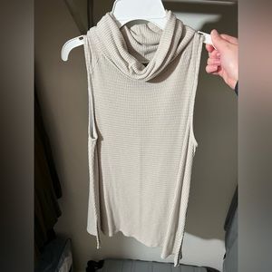 Allison Joy cream colored turtleneck sleeveless blouse
